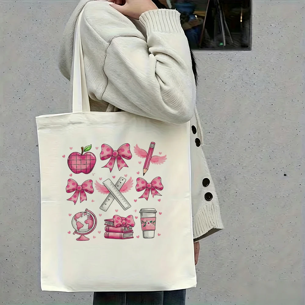 Trendy Coquette Pink Bow Canvas Tote Bag Reusable Eco Fabric Apple Book Printed Grocery Shopping Travel Shoulder Gift Bag
Trendy Coquette Pink Bow Canvas Tote Bag Reusable Eco Fabric Apple Book Printed Grocery Shopping Travel Shoulder Gift Bag