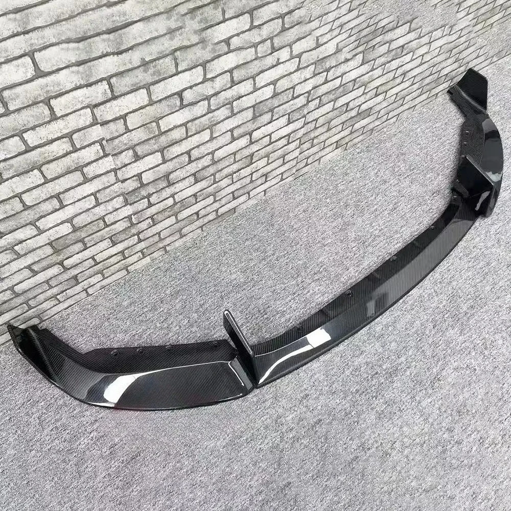 New Condition High Quality Dry Carbon Fiber Advertising Style Front Bumper Lip with High Polished Bolts for M2 G87
New Condition High Quality Dry Carbon Fiber Advertising Style Front Bumper Lip with High Polished Bolts for M2 G87