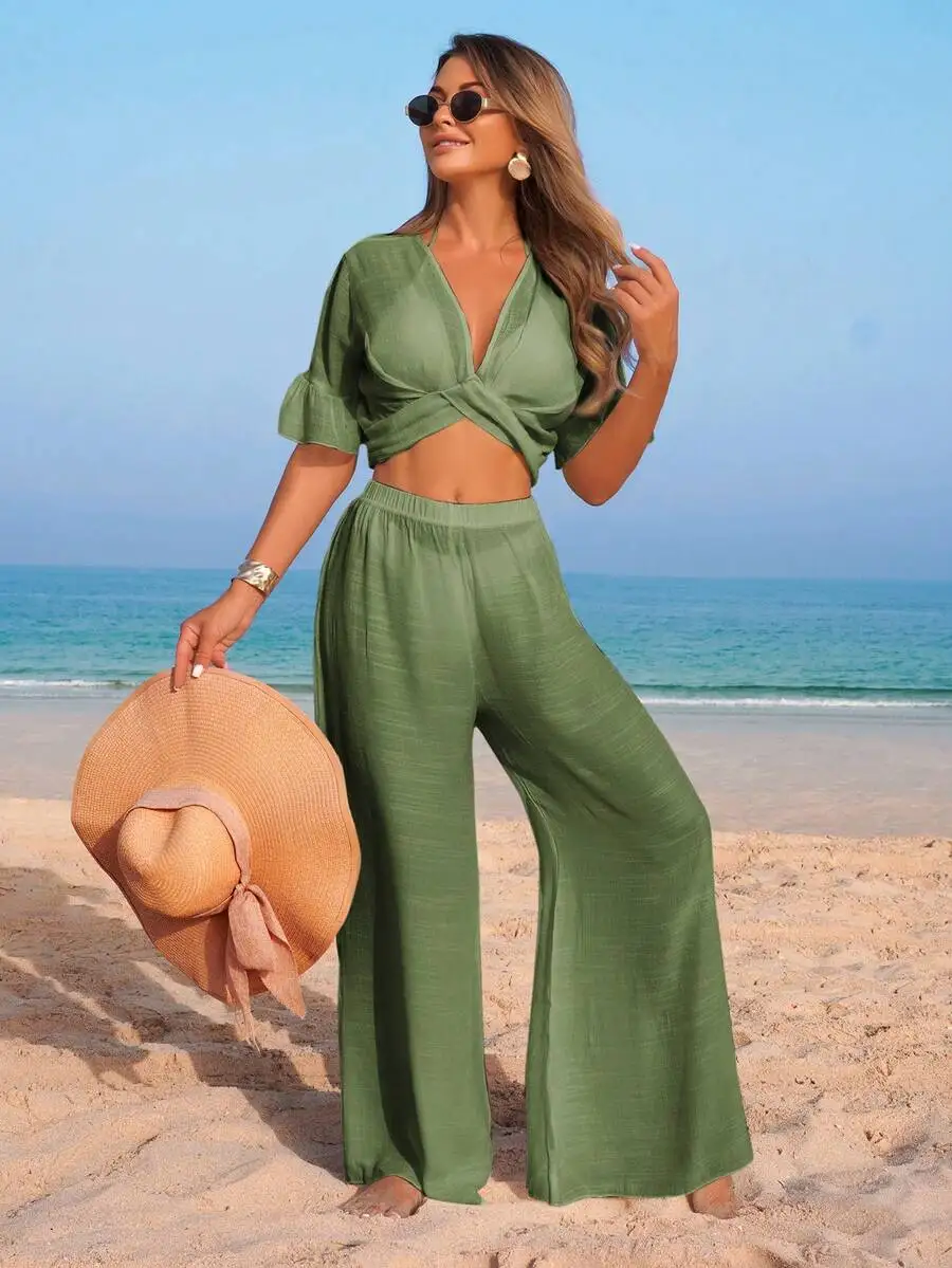 Women Solid V-Neck Ruffled Short Sleeve Crop Top And Wide Leg Pants Set
Women Solid V-Neck Ruffled Short Sleeve Crop Top And Wide Leg Pants Set