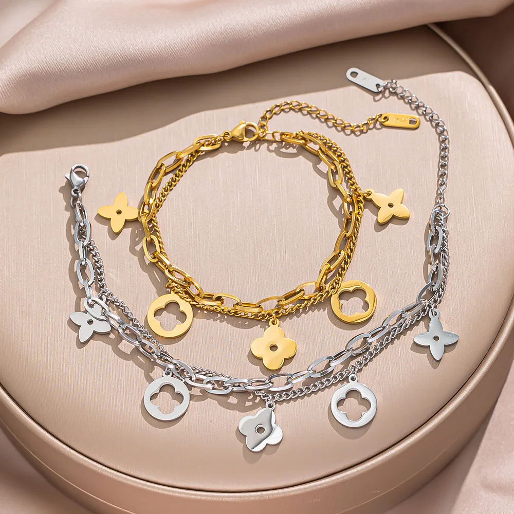 European and American Style Anti-allergy Double-layer Bracelet with Hollowed-out Four-leaf Flower and Multiple Pendants
European and American Style Anti-allergy Double-layer Bracelet with Hollowed-out Four-leaf Flower and Multiple Pendants