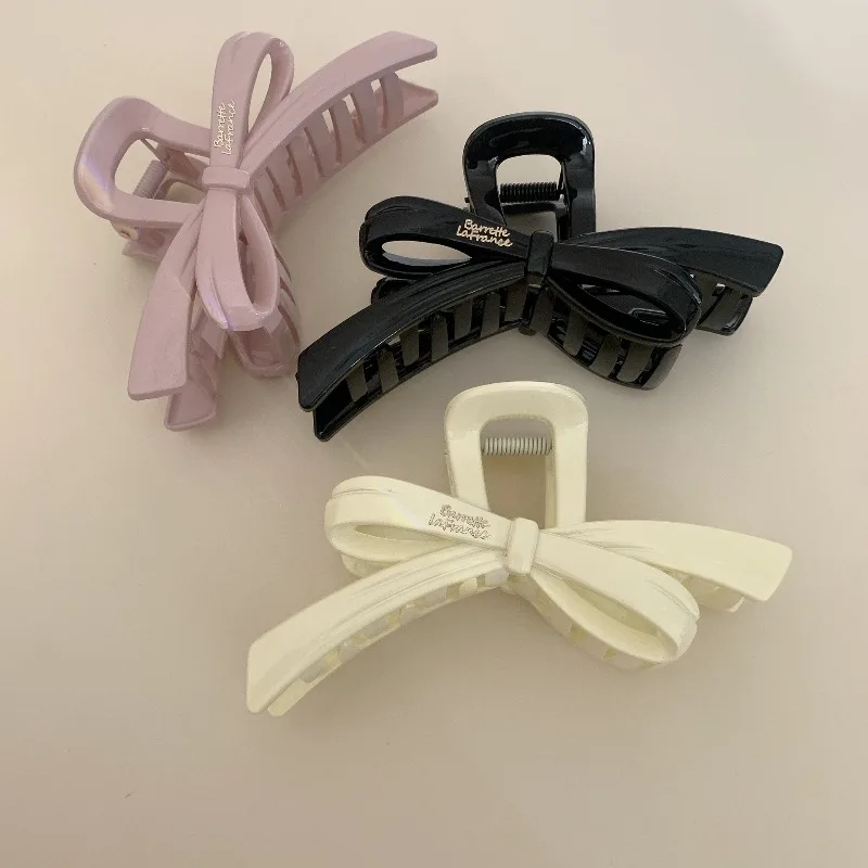 Sweet Acrylic Ribbon Bow Hair Claw Clip for Women Premium Durable Non Slip Lightweight High Quality Fashion Styling Accessory
Sweet Acrylic Ribbon Bow Hair Claw Clip for Women Premium Durable Non Slip Lightweight High Quality Fashion Styling Accessory