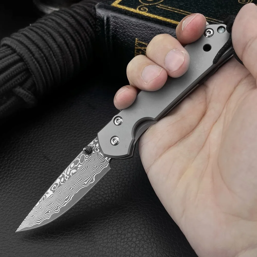 Portable Outdoor Sports Folding Knife Utility Tactical Pocket Knife Damascus Steel Blade Titanium Alloy Handle Fruit Knife
Portable Outdoor Sports Folding Knife Utility Tactical Pocket Knife Damascus Steel Blade Titanium Alloy Handle Fruit Knife