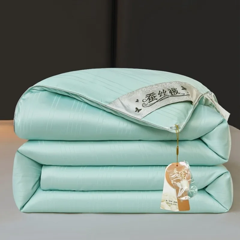 New solid color simple satin silk quilt spring and autumn cotton thickened winter quilt universal in all seasons
New solid color simple satin silk quilt spring and autumn cotton thickened winter quilt universal in all seasons