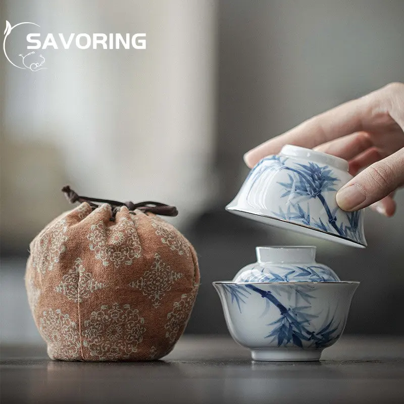 90ml Antique Hand-painted Bamboo Ceramic Teaset Blue and White Cover Bowl 1 Bowl 1 Cup with Storage Bag Outdoor Travel Small Set
90ml Antique Hand-painted Bamboo Ceramic Teaset Blue and White Cover Bowl 1 Bowl 1 Cup with Storage Bag Outdoor Travel Small Set