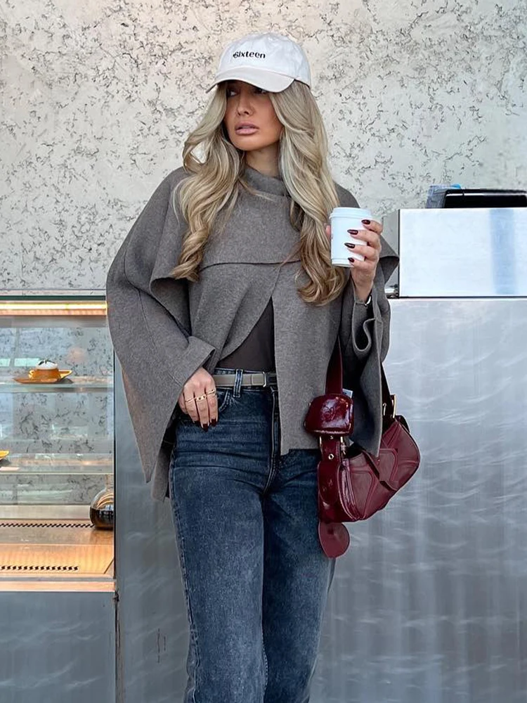 TRAFZA Woman's Casual Asymmetrical Coat O-Neck Long Sleeve Single Button Knitted Coat Autumn Jacket Woman Trendy 3 Color
TRAFZA Woman's Casual Asymmetrical Coat O-Neck Long Sleeve Single Button Knitted Coat Autumn Jacket Woman Trendy 3 Color