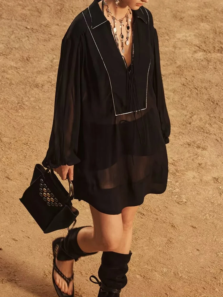 Spring new women's clothing European and American fashion all-match translucent lapel long sleeve long shirt
Spring new women's clothing European and American fashion all-match translucent lapel long sleeve long shirt