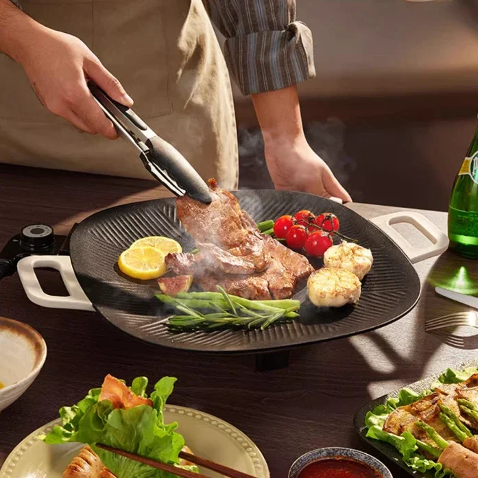 Electric grill pan Household multi-functional barbecue special pot Light smoke non-stick integrated pot Electric grill pot
Electric grill pan Household multi-functional barbecue special pot Light smoke non-stick integrated pot Electric grill pot