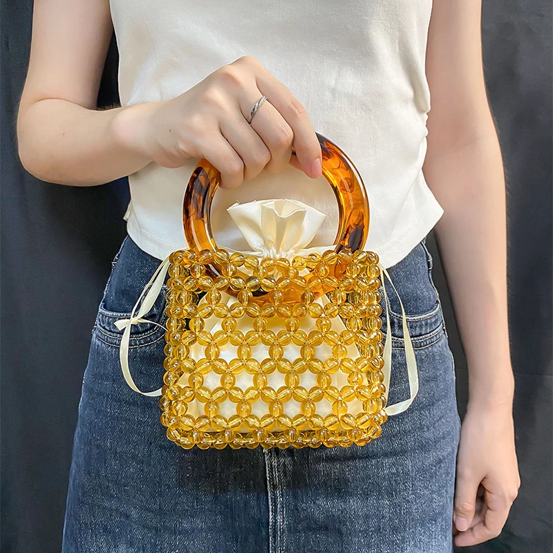 Niche Design 2025 Summer New Bucket Handmade Beaded Acrylic Hand Woven Banquet Handbag
Niche Design 2025 Summer New Bucket Handmade Beaded Acrylic Hand Woven Banquet Handbag