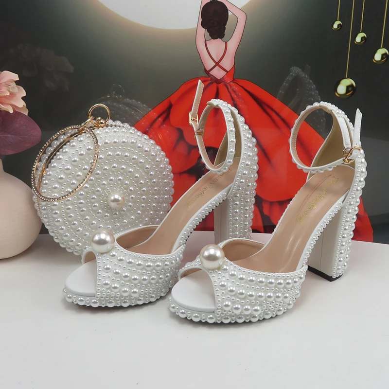 2024 New Arrival Hademade White Sandals Bridal shoes bag set woman Big Pearl Girls fashion Sandals party Shoes Fashion Thin Heel
2024 New Arrival Hademade White Sandals Bridal shoes bag set woman Big Pearl Girls fashion Sandals party Shoes Fashion Thin Heel
