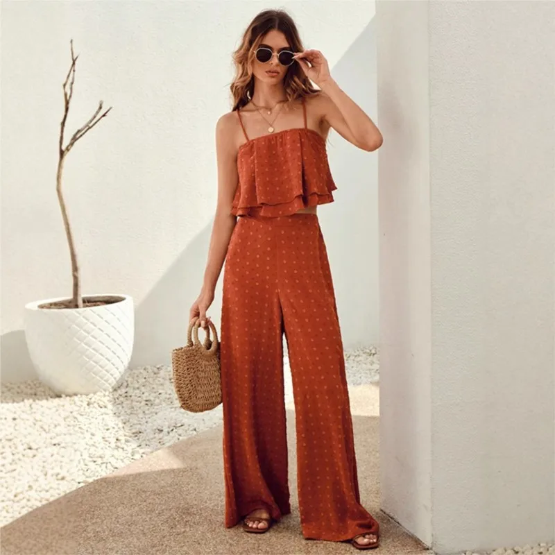 Женский модный комплект из 2 предметов с открытой спиной, летние сексуальные свободные однотонные брюки, женский костюм на тонких бретельках с широкими штанинами для женщин
Женский модный комплект из 2 предметов с открытой спиной, летние сексуальные свободные однотонные брюки, женский костюм на тонких бретельках с широкими штанинами для женщин