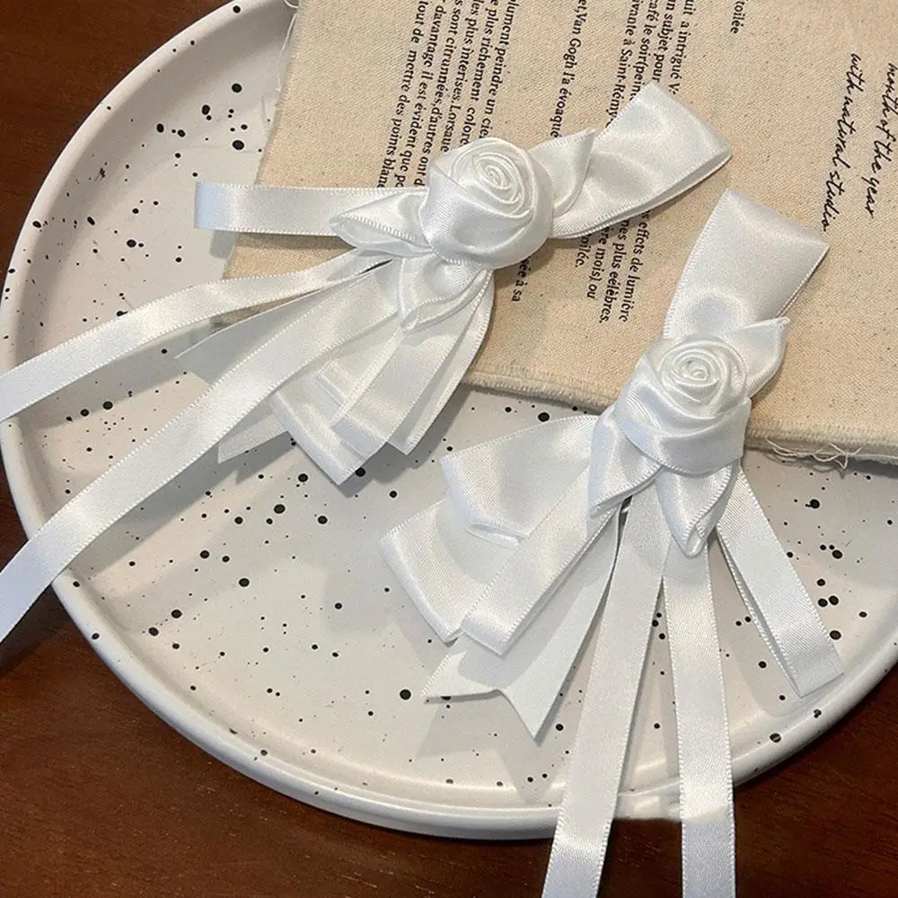 Заколки для волос с белым бантом и лентой для женщин и девочек, элегантные атласные заколки с цветочным бантом, зажим для хвоста, заколка для свадебной вечеринки, аксессуары
Заколки для волос с белым бантом и лентой для женщин и девочек, элегантные атласные заколки с цветочным бантом, зажим для хвоста, заколка для свадебной вечеринки, аксессуары