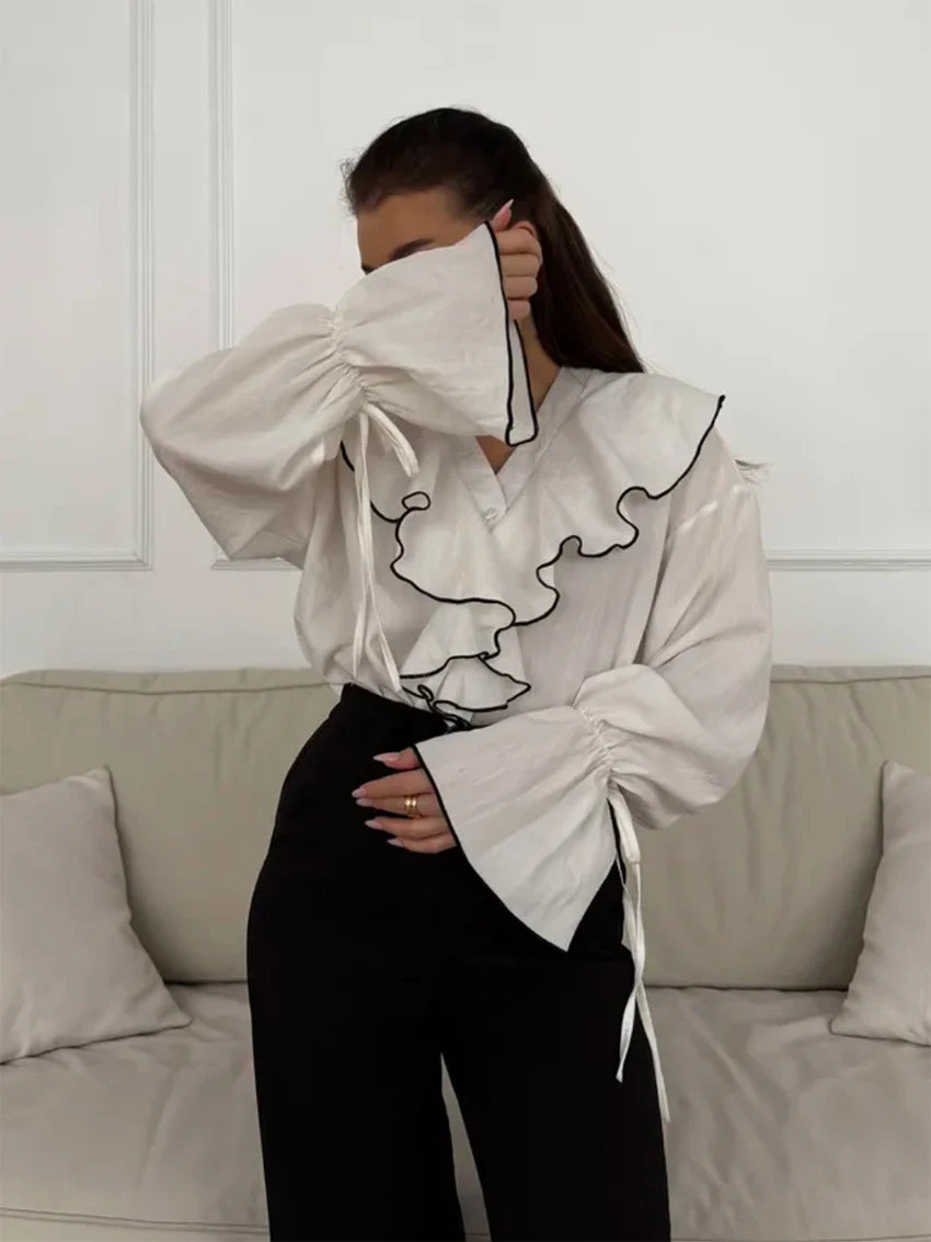 Parc Fee Fashion Loose White Office Women's Shirt 2025 Casual V-Neck Long Sleeve Shirt Elegant Ruffles Solid Top Female Clothing
Parc Fee Fashion Loose White Office Women's Shirt 2025 Casual V-Neck Long Sleeve Shirt Elegant Ruffles Solid Top Female Clothing