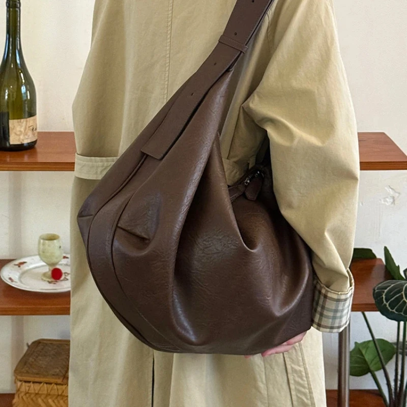 Large Capacity Retro Soft Leather Dumpling Bag for Women, 2026 New High-end Casual Shoulder and Crossbody Tote Bag
Large Capacity Retro Soft Leather Dumpling Bag for Women, 2026 New High-end Casual Shoulder and Crossbody Tote Bag