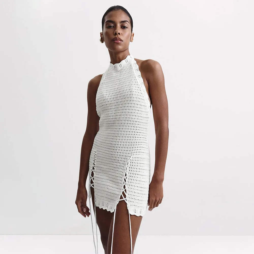 2026 Spring Summer New Knitted Hanging Neck Short Skirt Hook Weaving Hollow Strap Backless Fork Slim Knitted Short Skirt
2026 Spring Summer New Knitted Hanging Neck Short Skirt Hook Weaving Hollow Strap Backless Fork Slim Knitted Short Skirt