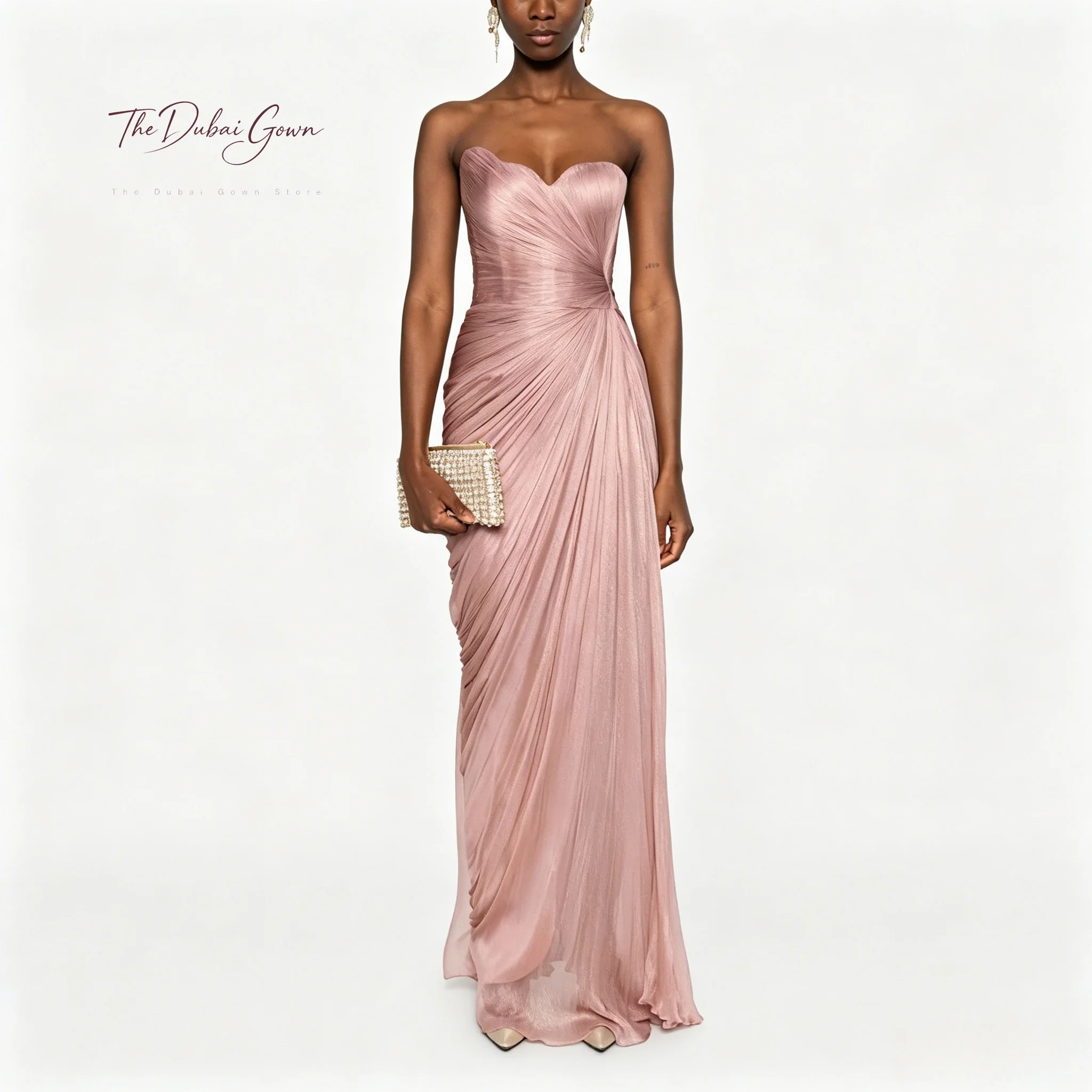 Elegant Pink Chiffon Strapless Sleeveless Floor-Length Mermaid Evening Gown with Ruched Waist Design
Elegant Pink Chiffon Strapless Sleeveless Floor-Length Mermaid Evening Gown with Ruched Waist Design
