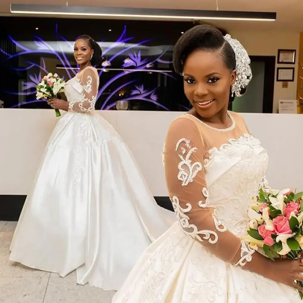 Customized Elegant Jewel Neck Pearls African Lace Lands Stain Country Wedding Gowns Custom Bridal Bride Dresses
Customized Elegant Jewel Neck Pearls African Lace Lands Stain Country Wedding Gowns Custom Bridal Bride Dresses