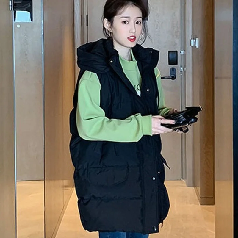 2025 Ladies Hooded Puffer Waistcoat Jacket Winter Female Loose Cotton Padded Vest Top Korean Women Solid Color Down Cotton Coat
2025 Ladies Hooded Puffer Waistcoat Jacket Winter Female Loose Cotton Padded Vest Top Korean Women Solid Color Down Cotton Coat