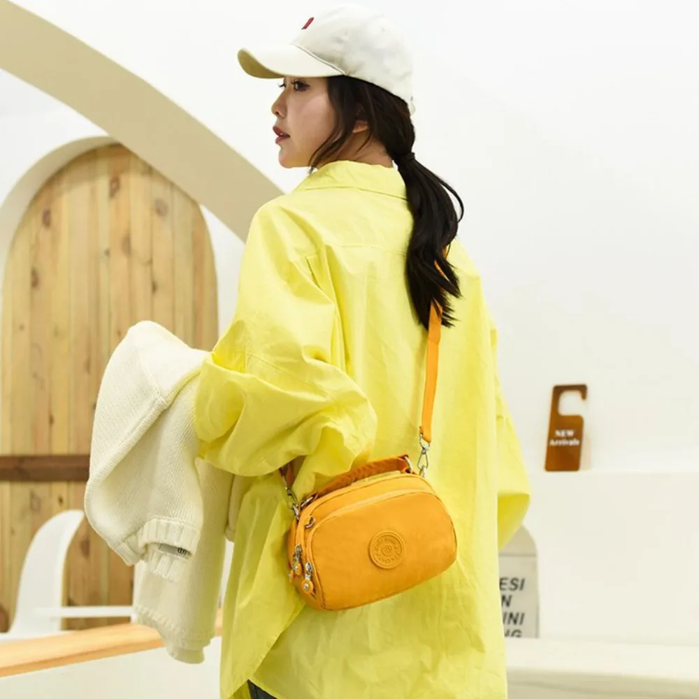 Zipper Multi Pocket Shoulder Bag Large Capacity Casual Mobile Phone Bag Multiple Usages Nylon Small Square Bag Female
Zipper Multi Pocket Shoulder Bag Large Capacity Casual Mobile Phone Bag Multiple Usages Nylon Small Square Bag Female