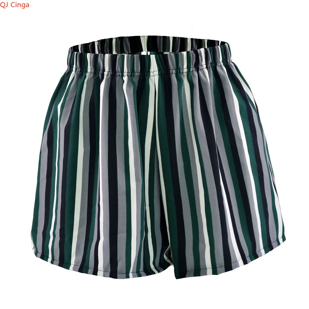 Women's Green Striped Shorts for Summer, with An Elastic Waistband in Yellow and Red—simple and Stylish Shorts.
Women's Green Striped Shorts for Summer, with An Elastic Waistband in Yellow and Red—simple and Stylish Shorts.