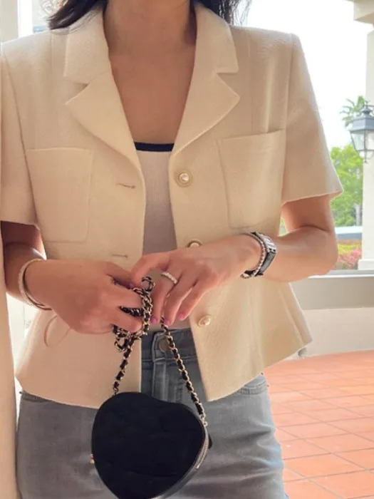 Korean Chic Summer Casual Loose Fit Short Sleeve Woolen Suit Jacket Women's Fashion Stylish Single Button Notch Lapel Coat
Korean Chic Summer Casual Loose Fit Short Sleeve Woolen Suit Jacket Women's Fashion Stylish Single Button Notch Lapel Coat