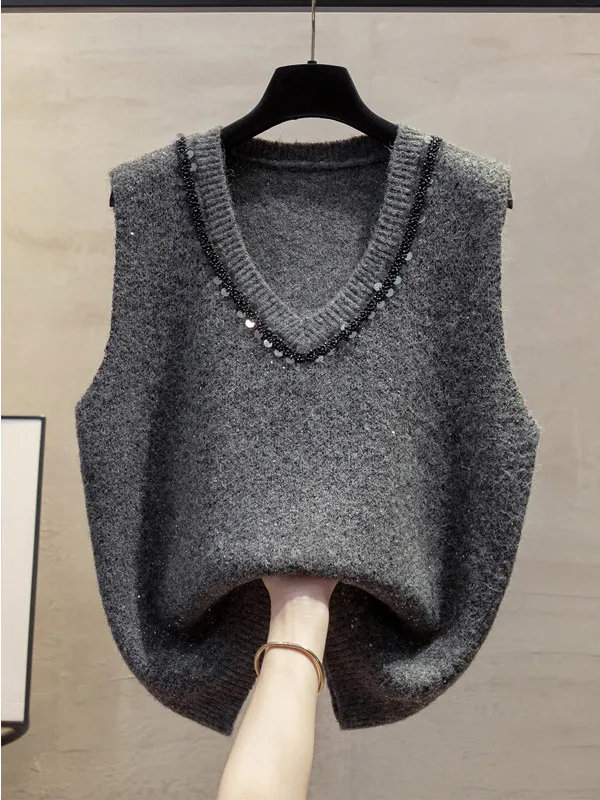 2026 Autumn New Knitted Vest Top Women's Glittering Sleeveless Overhead Style Fashionable Loose Fit V-Neck Polyester Blend
2026 Autumn New Knitted Vest Top Women's Glittering Sleeveless Overhead Style Fashionable Loose Fit V-Neck Polyester Blend