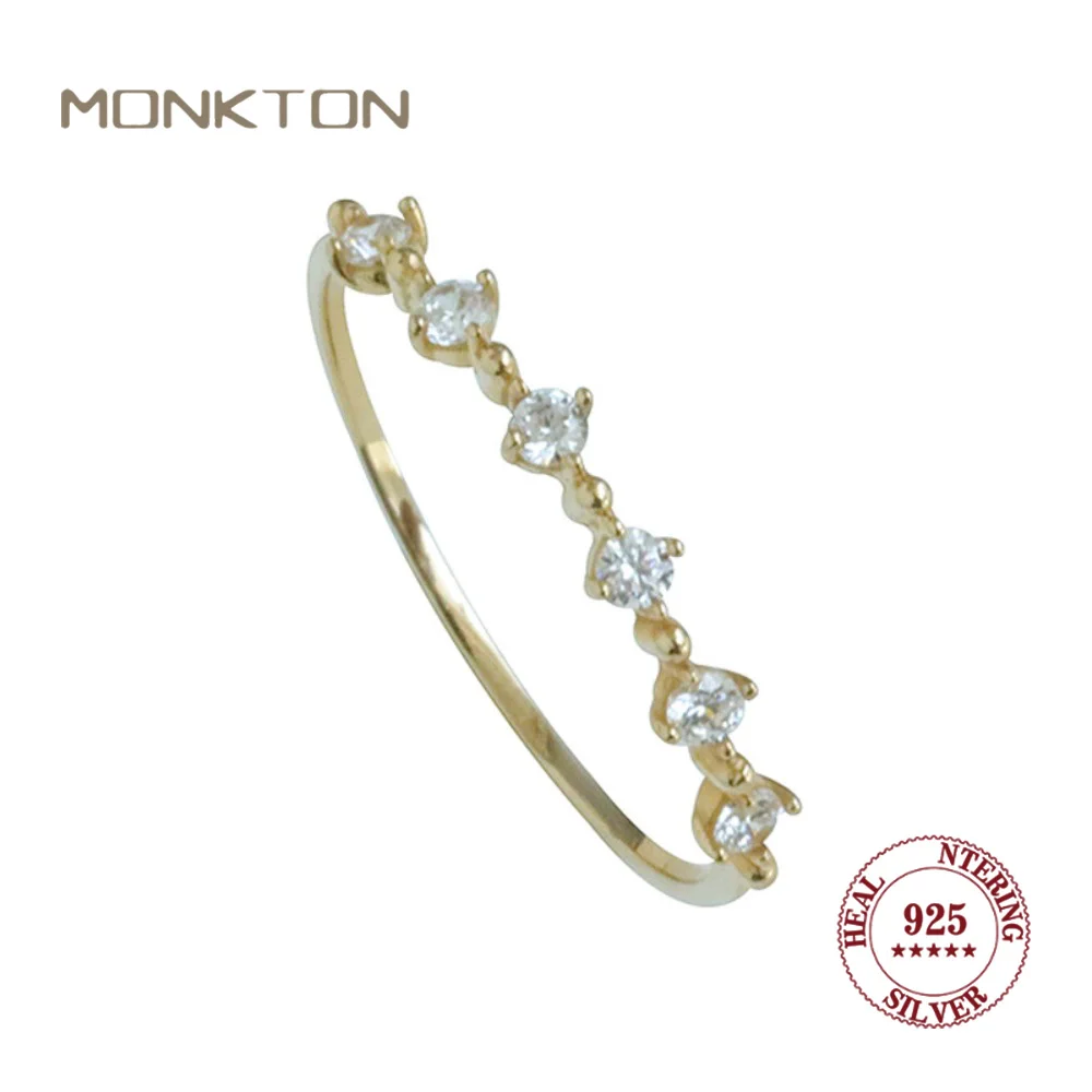 Кольцо Monkton из стерлингового серебра 925 пробы с сверкающим кубическим цирконием, нежный штабелируемый дизайн, модные украшения для женщин, повседневная одежда
Кольцо Monkton из стерлингового серебра 925 пробы с сверкающим кубическим цирконием, нежный штабелируемый дизайн, модные украшения для женщин, повседневная одежда
