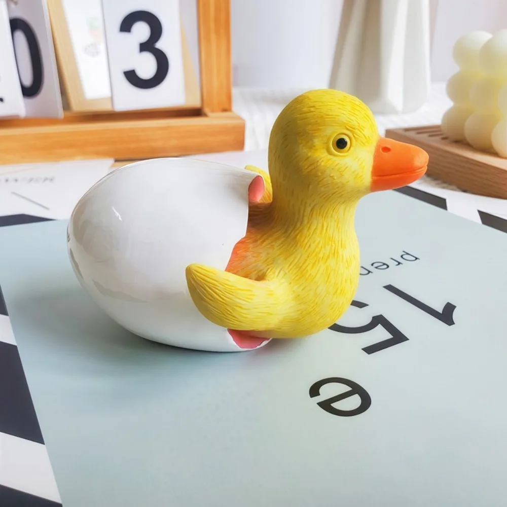 Cute Little Duck Figurine Resin Crafts Handicraft Duck Sculpture Toys Unique Hatching Duckling Ornament Car Interior Ornament
Cute Little Duck Figurine Resin Crafts Handicraft Duck Sculpture Toys Unique Hatching Duckling Ornament Car Interior Ornament