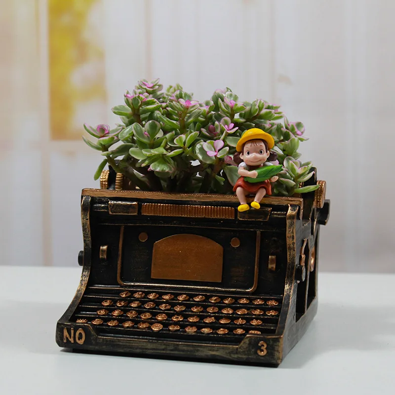 Retro Typewriter Shaped Succulent Planter Vintage Resin Flower Pot Mini Desktop Home Office Garden Decor Creative Plant Pot
Retro Typewriter Shaped Succulent Planter Vintage Resin Flower Pot Mini Desktop Home Office Garden Decor Creative Plant Pot