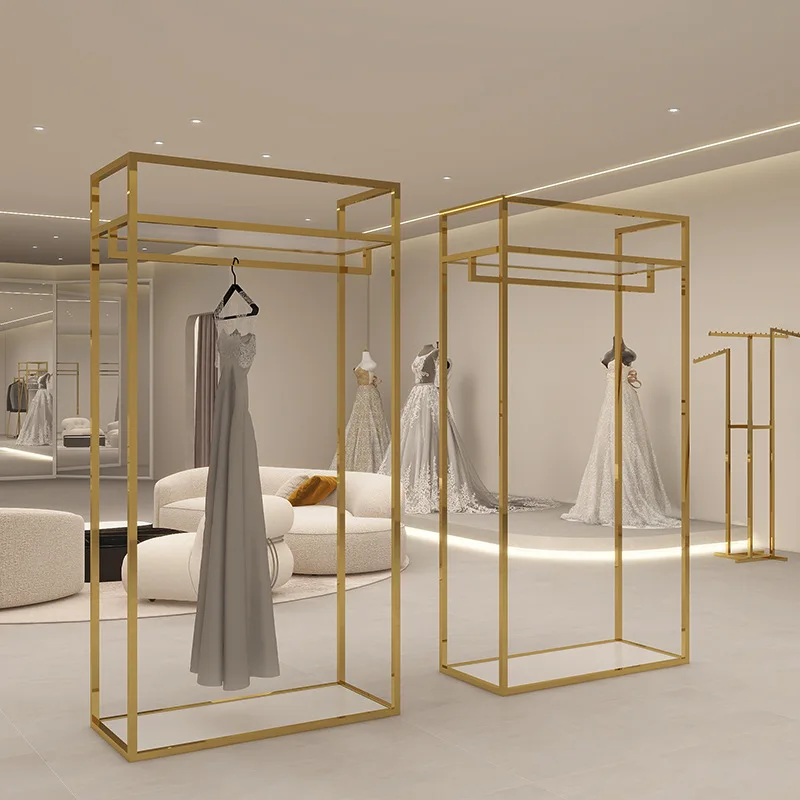 Wedding shop display stand, gold wrought iron square frame floor stand, light luxury dress display stand
Wedding shop display stand, gold wrought iron square frame floor stand, light luxury dress display stand