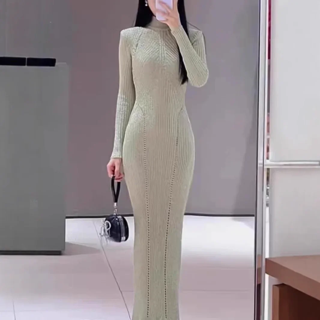 Women's autumn and winter new high collar knitted dress slim hollow holiday party fashion midi robe
Women's autumn and winter new high collar knitted dress slim hollow holiday party fashion midi robe