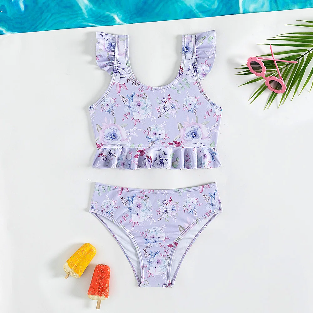 Girls two-piece Swimwear Floral Print purple Bikini Set Ruffles Fly Sleeve Bathing Suits Summer girls Beach wear 5-14Years
Girls two-piece Swimwear Floral Print purple Bikini Set Ruffles Fly Sleeve Bathing Suits Summer girls Beach wear 5-14Years