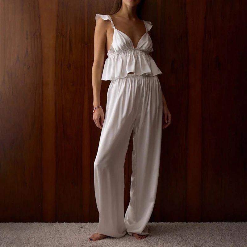 White sleeveless backless V-neck sling vest top loose wide-leg pants two-piece fashion casual suit
White sleeveless backless V-neck sling vest top loose wide-leg pants two-piece fashion casual suit