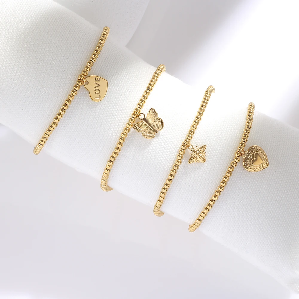New Fashion 18k Gold Plated Stainless Steel Beaded Bracelet For Women Lover Heart Evil Eye Butterfly Charm Elastic Rope Jewelry
New Fashion 18k Gold Plated Stainless Steel Beaded Bracelet For Women Lover Heart Evil Eye Butterfly Charm Elastic Rope Jewelry