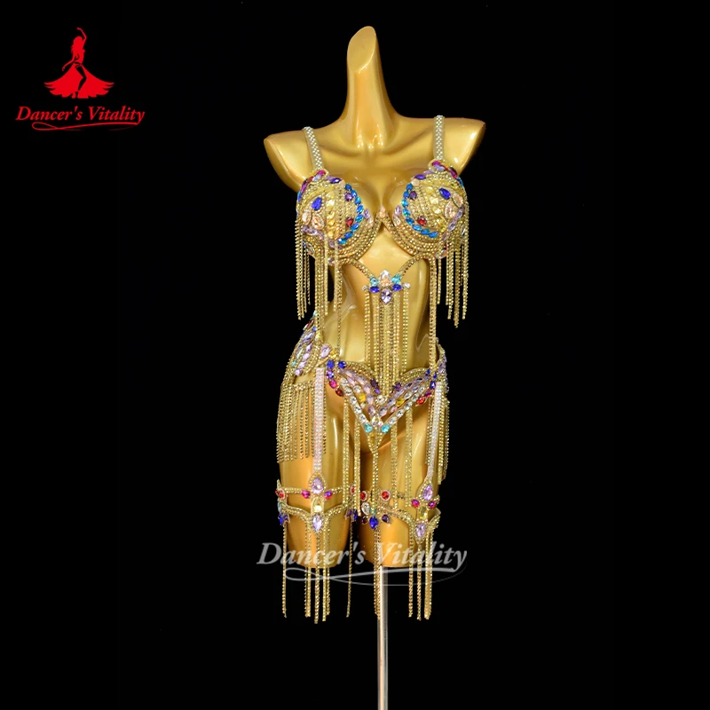 Костюм для выступлений по восточным танцам с камнями AB: топ с бахромой и пояс, комплект из двух предметов, профессиональный наряд для соревнований, для танцовщиц.
Костюм для выступлений по восточным танцам с камнями AB: топ с бахромой и пояс, комплект из двух предметов, профессиональный наряд для соревнований, для танцовщиц.