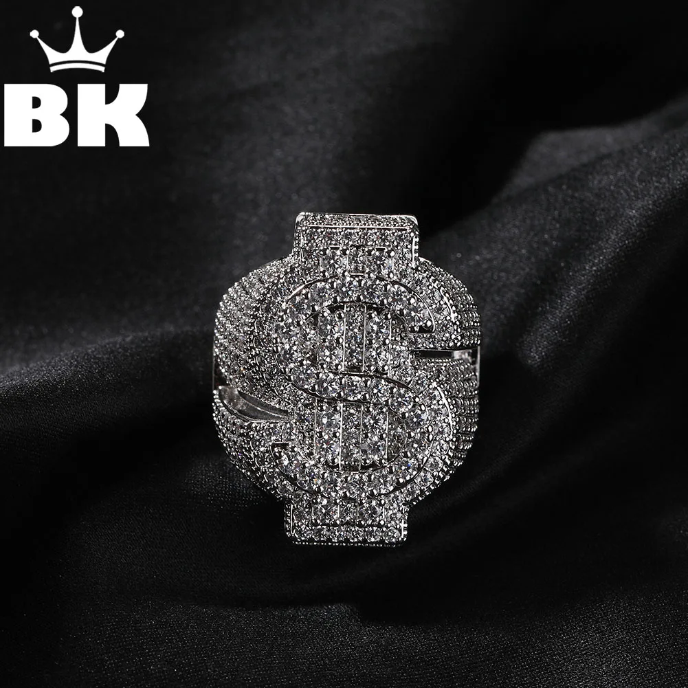 THE BLING KING Icy Dollar Sign Ring For Men Full Micro Paved 5A+ Cubic Zirconia Money Charm Punk Rock Finger Accessories Rapper
THE BLING KING Icy Dollar Sign Ring For Men Full Micro Paved 5A+ Cubic Zirconia Money Charm Punk Rock Finger Accessories Rapper