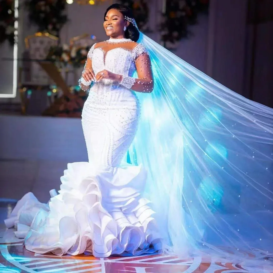 Customized Gorgeous High Neck Appliques Beads Mermaid Wedding Dresses Full Sleeves Cascading Ruffles African Vestido De Novia
Customized Gorgeous High Neck Appliques Beads Mermaid Wedding Dresses Full Sleeves Cascading Ruffles African Vestido De Novia