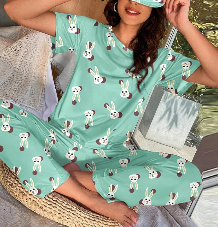 Women's new fashionable casual round neck cartoon printed short sleeved cartoon pants set with eye mask included
Women's new fashionable casual round neck cartoon printed short sleeved cartoon pants set with eye mask included