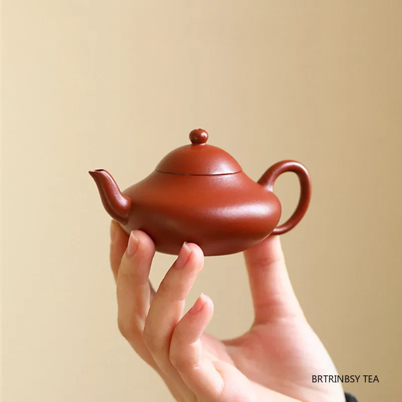 75ml Chinese Yixing Zisha Tea Pot Handmade Purple Clay Teapot Traditional Small Capacity Kettle Household Tea Set Teaware
75ml Chinese Yixing Zisha Tea Pot Handmade Purple Clay Teapot Traditional Small Capacity Kettle Household Tea Set Teaware