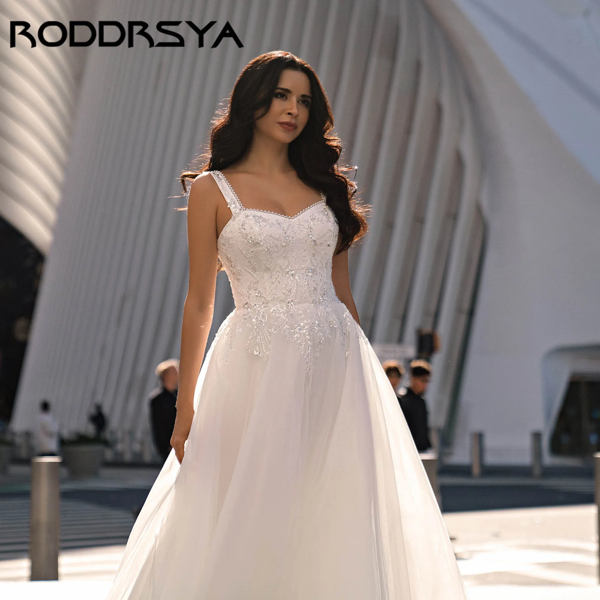 RODDRSYA Elegant Pearls Sequins Wedding Dress Wide Straps A-line Tulle Bride Gowns Backless Classic vestidos de novia Customized
RODDRSYA Elegant Pearls Sequins Wedding Dress Wide Straps A-line Tulle Bride Gowns Backless Classic vestidos de novia Customized