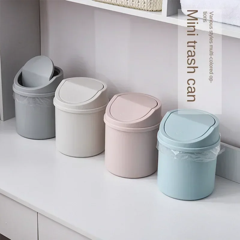 Desktop trash can Household living room plastic small covered mini table with creative cover trash can table
Desktop trash can Household living room plastic small covered mini table with creative cover trash can table