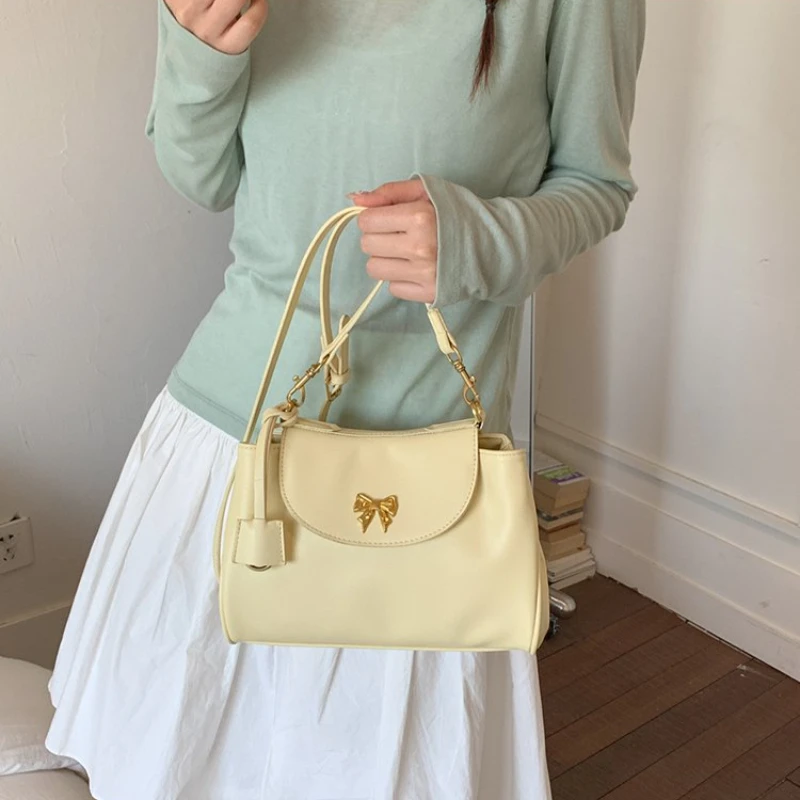 Multi-purpose PU Shoulder Bag with Flap & Bow Metal Detail for Women's Everyday School Office Casual Weekend Errands & Daily Use
Multi-purpose PU Shoulder Bag with Flap & Bow Metal Detail for Women's Everyday School Office Casual Weekend Errands & Daily Use