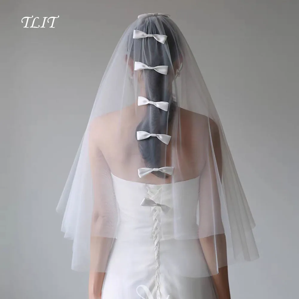 TLIT Фея Белый бант Свадебная фата невесты Короткая фата длиной до локтя Свадебная фата из тюля с белым атласным бантом и вырезанным краем по индивидуальному заказу
TLIT Фея Белый бант Свадебная фата невесты Короткая фата длиной до локтя Свадебная фата из тюля с белым атласным бантом и вырезанным краем по индивидуальному заказу
