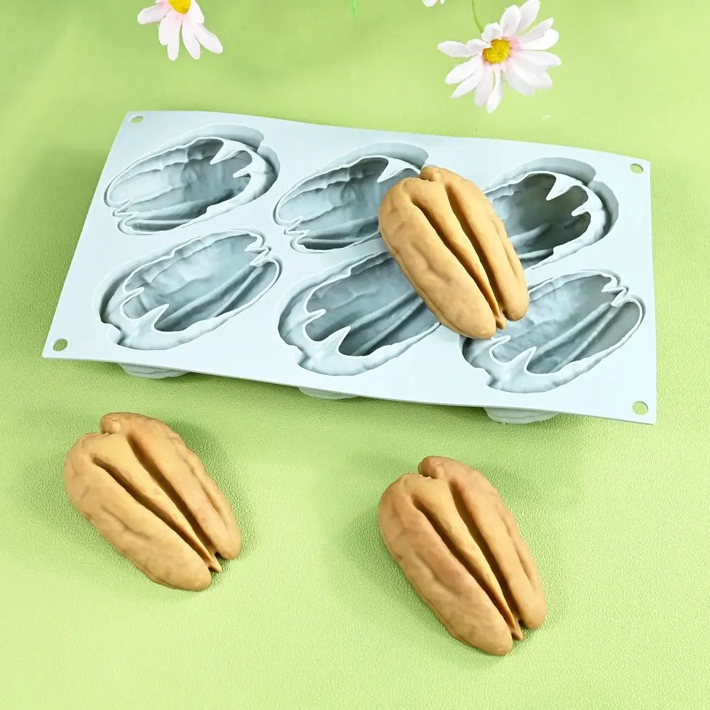 6 Cavity Nuts Silicone Mold Heat Resistant Flexible Almond Shaped Dessert Mold Handmade Food Grade Silicone
6 Cavity Nuts Silicone Mold Heat Resistant Flexible Almond Shaped Dessert Mold Handmade Food Grade Silicone