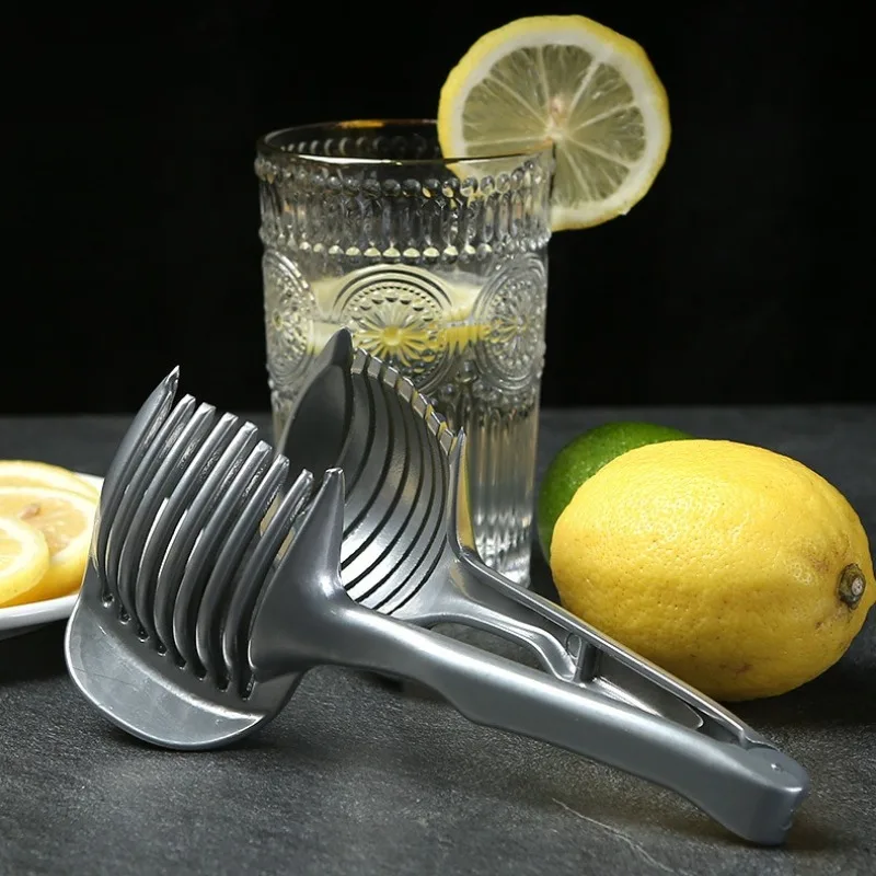 Stainless Steel Kitchen Onion Slicer Fruit Cutter Handheld Tomato Cutting Clip Orange Lemon Slicer Kitchen Accessories
Stainless Steel Kitchen Onion Slicer Fruit Cutter Handheld Tomato Cutting Clip Orange Lemon Slicer Kitchen Accessories