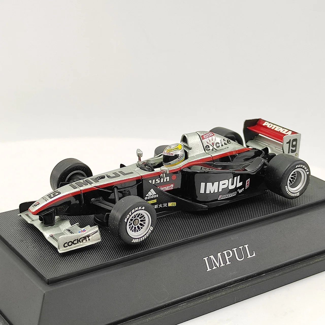 Box Cracked EBBRO масштаб 1:43 TEAM IMPUL Formula Racing модель автомобиля из черного сплава
Box Cracked EBBRO масштаб 1:43 TEAM IMPUL Formula Racing модель автомобиля из черного сплава