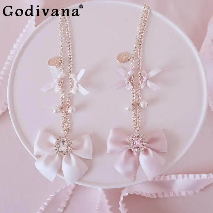 2026 New Japanese Sweet and Cute Ribbon Bow Pearl Chain Shoulder Bag Pendant Fashion Versatile Luggage Accessories
2026 New Japanese Sweet and Cute Ribbon Bow Pearl Chain Shoulder Bag Pendant Fashion Versatile Luggage Accessories