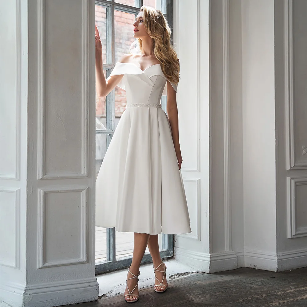 White Wedding Dress Short A Line Off Shoulder Simple Wedding Gown for Women 2023 Tea Length Beading Belt Midi Bridal Dresses
White Wedding Dress Short A Line Off Shoulder Simple Wedding Gown for Women 2023 Tea Length Beading Belt Midi Bridal Dresses