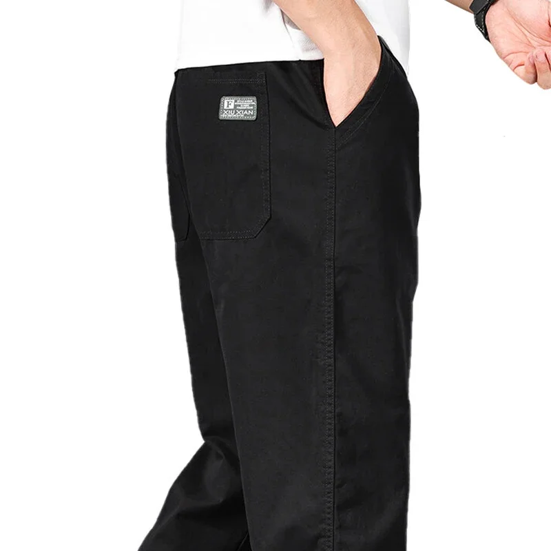 Мужские брюки-джоггеры, лето-весна, большие размеры, мужские повседневные брюки, свободный крой, хлопковые брюки, спортивные штаны с эластичной резинкой на талии и шнурком
Мужские брюки-джоггеры, лето-весна, большие размеры, мужские повседневные брюки, свободный крой, хлопковые брюки, спортивные штаны с эластичной резинкой на талии и шнурком