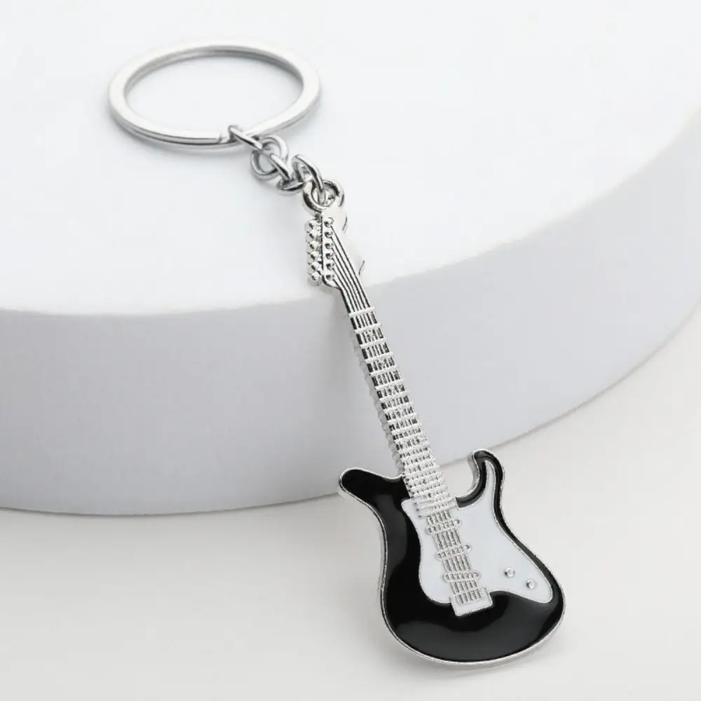 Simple Zinc Alloy Guitar Keychain Musical Elements Portable Bag Pendant Bass Music Lovers Gift Travel Souvenirs
Simple Zinc Alloy Guitar Keychain Musical Elements Portable Bag Pendant Bass Music Lovers Gift Travel Souvenirs