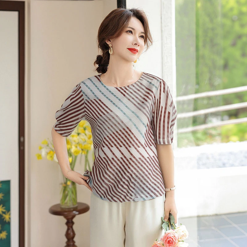 Summer Casual Loose Tunic Tops Commute Shirts Korean Fashion Half Sleeve Blouses Women Elegant O Neck Striped Blusas
Summer Casual Loose Tunic Tops Commute Shirts Korean Fashion Half Sleeve Blouses Women Elegant O Neck Striped Blusas